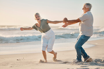 Old couple, holding hands and playing on beach for love, travel and sea waves for retirement. Senior people, marriage and holiday for laughing by water, happy and silly wife on weekend vacation