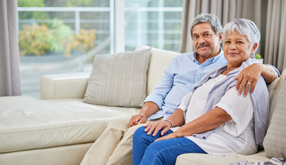 Hug, love and portrait with senior couple on sofa of home living room together for bonding. Marriage, relax or security with elderly man and woman in apartment for relationship, retirement or romance