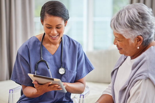Happy woman, nurse and patient with tablet in elderly care for home assistance, checkup or advice. Young female person or medical caregiver talking to mature client on technology for healthcare plan