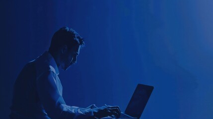 Royal blue banner with a slight grainy texture, presenting a businessman in a white shirt, confidently typing on a laptop. 