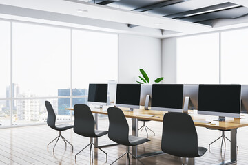 Contemporary bright coworking office interior with wooden flooring, panoramic windows and city view, furniture and equipment. 3D Rendering.