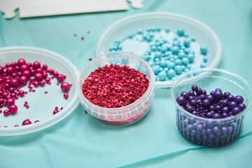 Various lollipops and nuts for making a culinary dessert