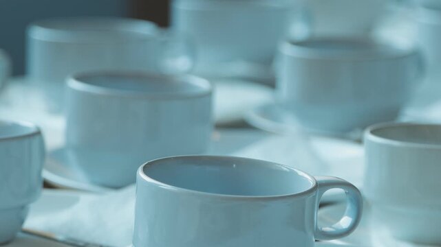 a row of empty cups can be a void waiting to be filled. The cups are still empty, open to be filled with anything.