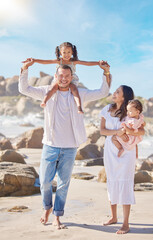 Portrait, dad and carrying of daughter, beach and family in vacation for fresh air, smile or bonding. Outdoor, man and woman with children for fun, parents and kids in sea of Florida, nature or water