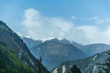 Snowy mountain peak in Jiuzhaigou National Park, China