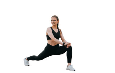 Woman performing a stretching exercise on an urban pathway, promoting flexibility and fitness against transparent background