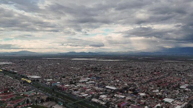 Gray and cloudy day in Ecatepec, aerial view of Mexico City metro area