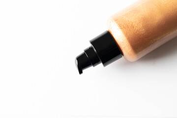 Shimmer body lotion bottle on white isolated backgrpund Copy space