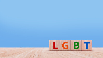LGBTQ, Concept of Lgbt rights and law, wooden blocks with Text LGBTQ, symbol of law and justice in...