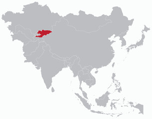 Obraz premium Highlighted map of KYRGYZSTAN inside detailed blank flat political map of the Asian continent on isolated background