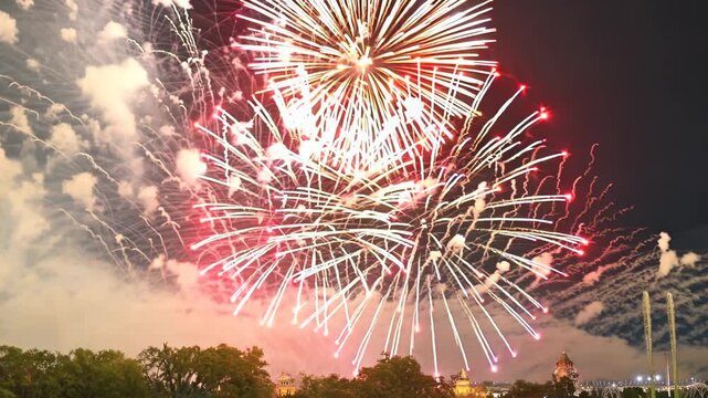 Stunning fireworks display lights up the night sky in the city center during the grand finale