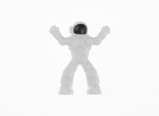plastic toy astronaut isolated on white background