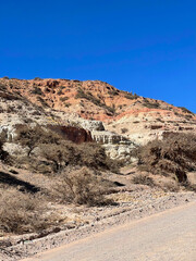 Old crumbling mountains in the Jujuy region on a sunny day, Argentina