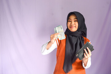 Woman counting money. A woman's hand holds a rupiah denomination banknote. business woman rich woman hands holding and counting, paying ruble banknotes or paper banknotes