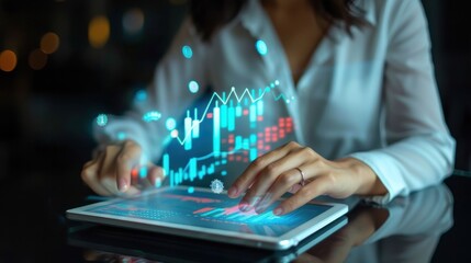 Businesswoman using a tablet with holographic financial graphs and blockchain visuals, fintech, advanced financial solutions