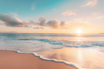Obraz premium Ocean glows gold at sunset, waves gently lapping on the shore, inviting relaxation and calm in nature's beauty