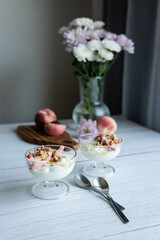 Greek yoghurt with peach and honey. Hight key. Place for text