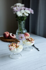 Greek yoghurt with peach and honey. Hight key. Place for text