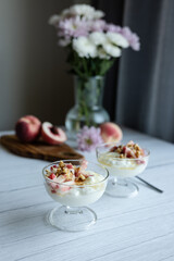 Greek yoghurt with peach and honey. Hight key. Place for text
