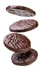 Chocolate covered cookies flying close-up on white. Isolated