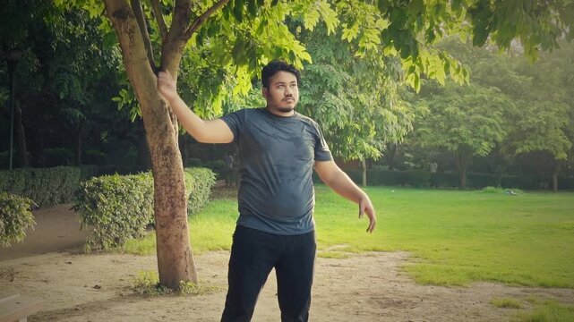fat man exercising at outdoor maintaining a healthy lifestyle