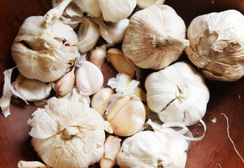 Garlic bulbs top view. Food background. Spicy seasoning 