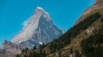 Majestic Matterhorn Mountain towering over Zermatt, Switzerland on a clear blue sky day