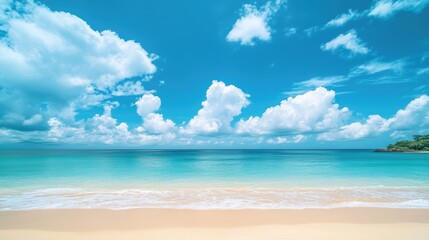 Gorgeous tropical beach with clear blue sky and fluffy white clouds. Perfect for summer vacation.