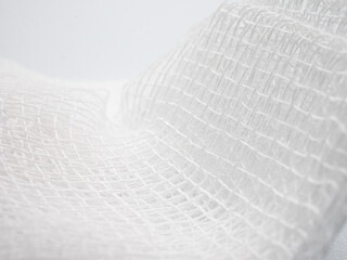 Close-up of white medical bandage Details and textures woven pattern background, Macro photo details of bandage weaving fibers, wallpapers