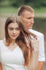 Fototapeta premium A man and a woman are standing next to each other