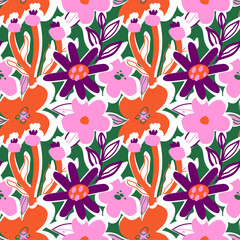 Various abstract flowers on a green background seamless pattern. Bright floral ornament in the style of naive art.