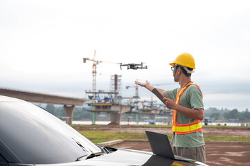 Engineer flies drone to inspect bridge