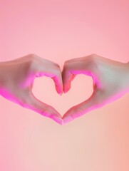 Fototapeta premium Human hands forming a heart shape, symbol of love and affection.