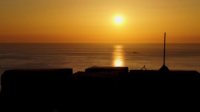 Fiery Orange Sunset Over Mediterranean Sea In Nigran, Spain - Drone Shot