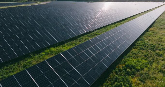 Drone shot of the biggest solar farm in Sweden outside Str&auml;ngn&auml;s, Stockholm. Slow moving wide shot.