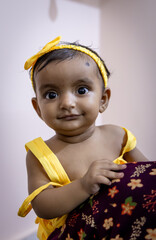 cute toddler innocent facial close up shot at outdoor at day from flat angle