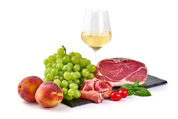 Italian prosciutto crudo or spanish jamon with grape, isolated on white background.