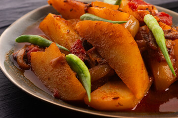 fried potatoes with paprika sauce. crispy fried patata bravas, fried potatoes with smoked paprika sauce