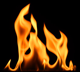 fire on a black background, burning and hot flames, close view