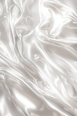 Close-up of luxurious white silk fabric with smooth textures and elegant creases, perfect for backgrounds or design elements.