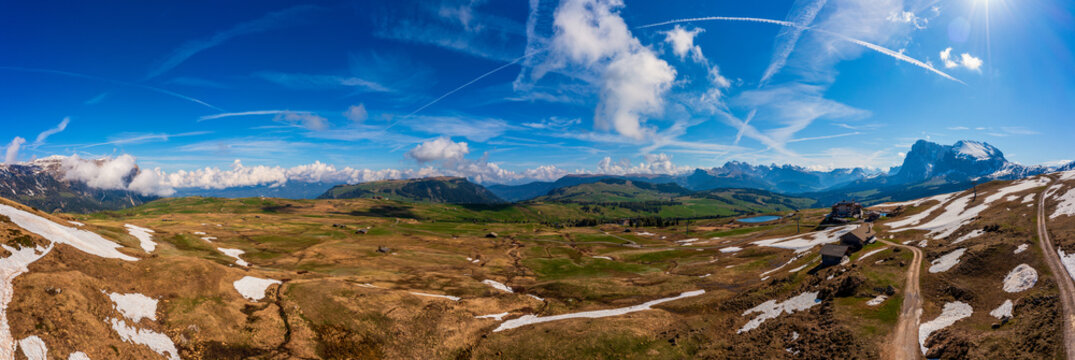 Panoramic view from the Seiser Alm to the Dolomites in Italy, drone shot.