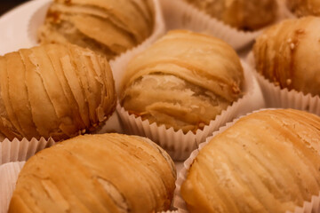 close up of Chinese fried Puff Pastries Filled with Shredded Turnip, baked deep fried turnip radish cake