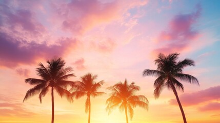 Serene Tropical Paradise: Silhouetted Palm Trees Against Vibrant Sunset Sky