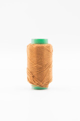 Colorful Spool of sewing thread, spool of industrial threads, Colored spools of thread on a white background.