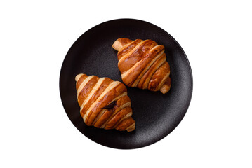 Delicious crispy sweet croissant cornet with chocolate