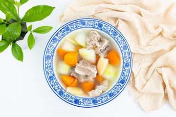 A bowl of carrot, winter melon and pork ribs soup