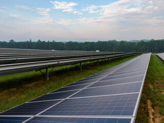 Morning Drone Images of a Large Renewable Solar Farm in Louisburg North Carolina Using Technology and Science for Green Energy & Lowering Carbon Footprints. 