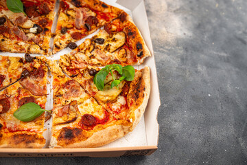 pizza chicken meat, sausages, olives, cheese, tomato sauce.fresh meal food snack on the table copy space food background rustic top view