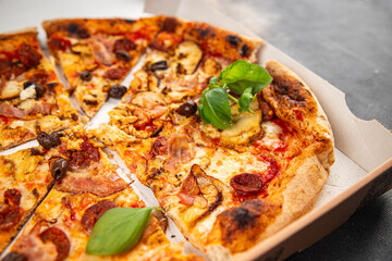 pizza chicken meat, sausages, olives, cheese, tomato sauce.fresh meal food snack on the table copy space food background rustic top view