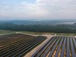 Morning Drone Images of a Large Renewable Solar Farm in Louisburg North Carolina Using Technology...